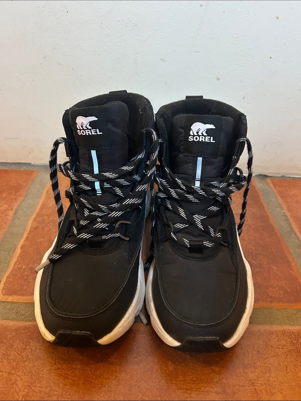 Sorel Black and White Lace-Up Ankle Boots